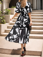 Schwarz-weißes Maxikleid: Grafik-Print, V-Ausschnitt & elegante Puffärmel S-2XL