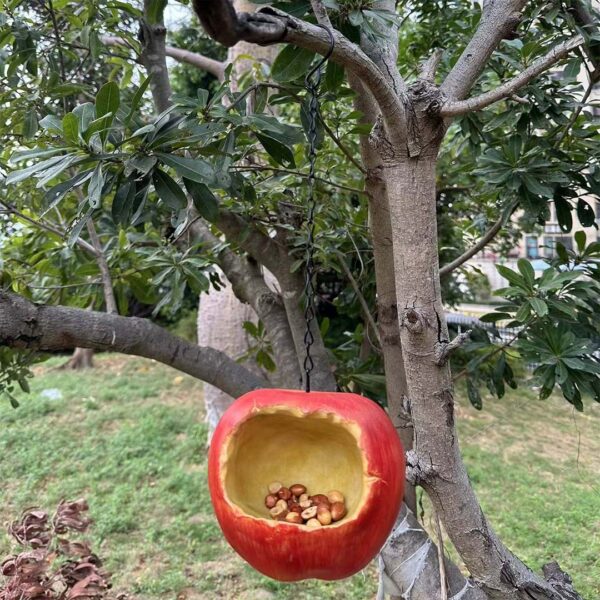 Garten-Vogelfutterstation in dekorativer Apfelform aus Harz